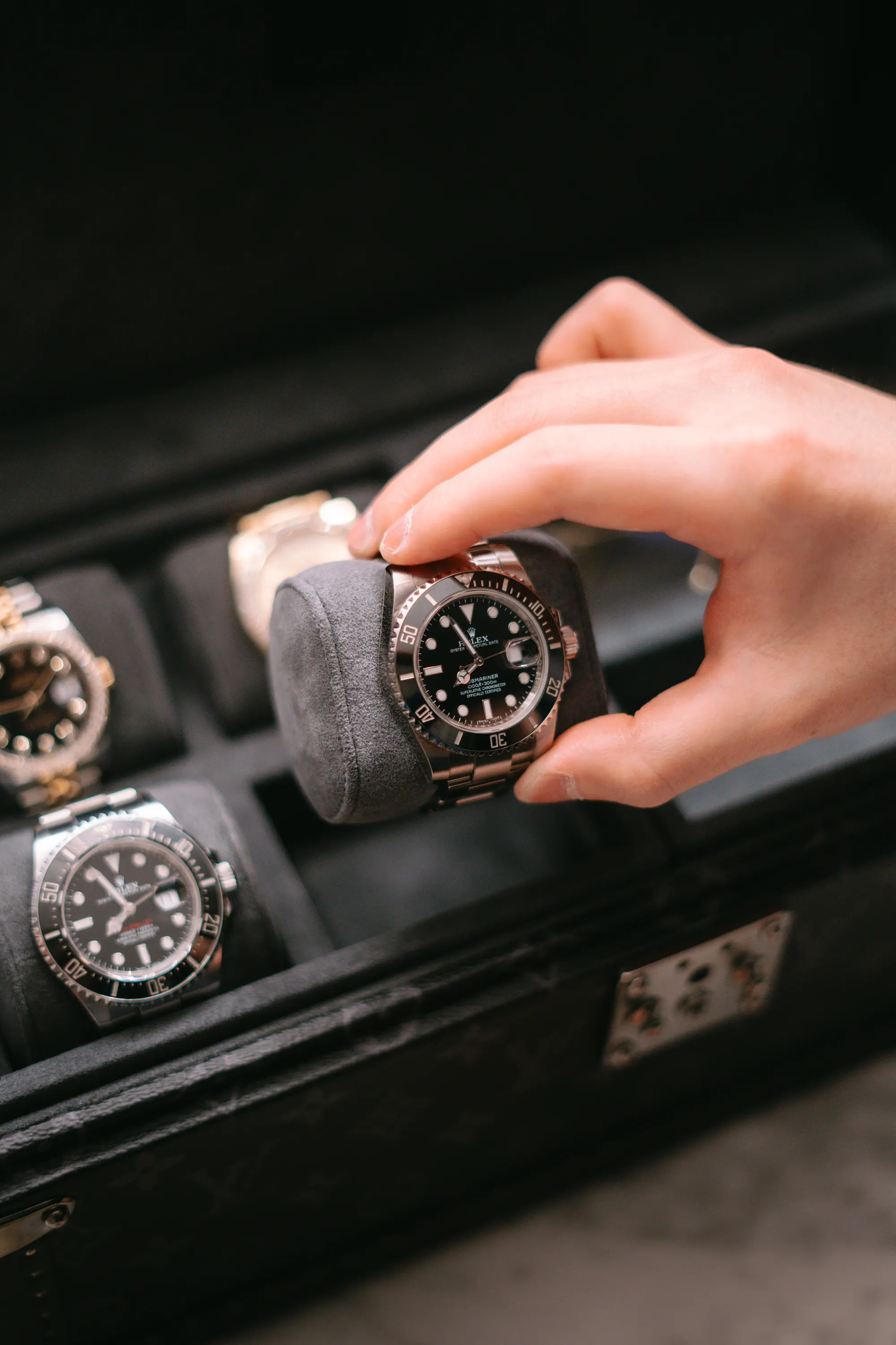 A luxury timepiece against a quiet, atmospheric backdrop